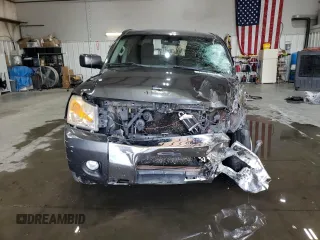 2012 Nissan Titan S with VIN 1N6AA0EC7CN311143, listed as a Copart auction lot 75181784 with 214,351 mi miles and Salvage Title. Bid and sale history available at carsss.com. Image 5.