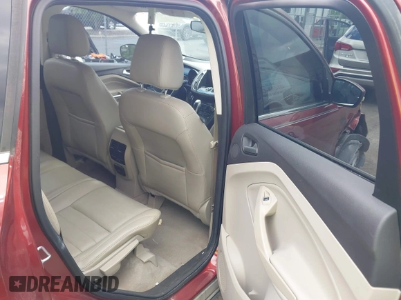 2015 Ford Escape Titanium z VIN 1FMCU0J99FUA92432, wystawiony jako IAAI lot #42257036 z przebiegiem 127 632 mil mil oraz . Historia ofert i sprzedaży dostępna na DreamBid. Obrazek 8.