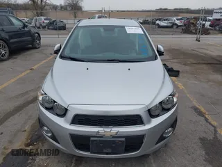 2012 Chevrolet Sonic LT with VIN 1G1JC5SH0C4162034, listed as a IAAI auction lot 41967195 with 87,086 mi miles and . Bid and sale history available at DreamBid. Image 12.