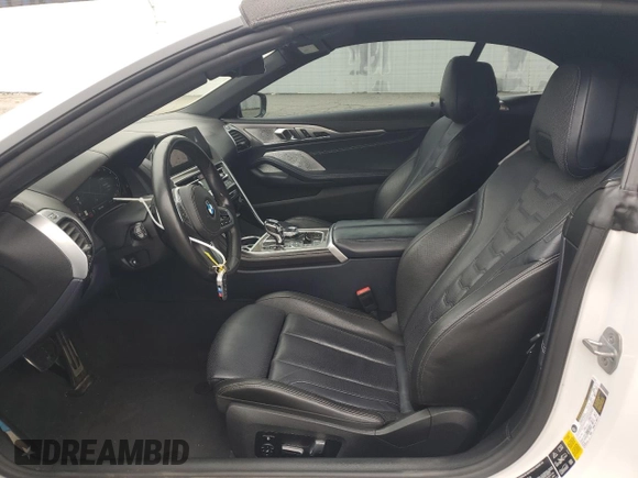 2019 BMW 8 Series M850i xDrive with VIN WBAFY4C57KBX38867, listed as a Copart auction lot 76091124 with 25,850 mi miles and Salvage title. Bid and sale history available at DreamBid. Image 7.