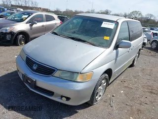 2001 Honda Odyssey EX z VIN 2HKRL18661H597205, wystawiony jako IAAI lot #41838509 z przebiegiem 317 084 mil mil oraz . Historia ofert i sprzedaży dostępna na DreamBid. Obrazek 2.