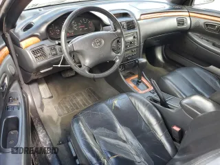 2002 Toyota Solara SE with VIN 2T1FF28P02C596323, listed as a Copart auction lot 49174755 with 179,904 mi miles and Salvage Title. Bid and sale history available at DreamBid. Image 8.