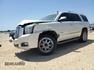 2015 GMC Yukon Denali z VIN 1GKS1CKJ3FR235577, wystawiony jako Copart lot #52417455 z przebiegiem 145 744 mil mil oraz Szkoda całkowita • Salvage title. Historia ofert i sprzedaży dostępna na DreamBid. Obrazek 1.