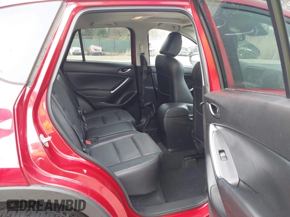 2016 Mazda CX-5 Grand Touring with VIN JM3KE4DY9G0865780, listed as a IAAI auction lot 41913914 with 76,579 mi miles. Bid and sale history available at carsss.com. Image 8.