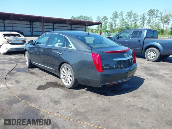 2014 Cadillac XTS Luxury z VIN 2G61M5S37E9211547, wystawiony jako IAAI lot #42373128 z przebiegiem 146 354 mil mil oraz . Historia ofert i sprzedaży dostępna na DreamBid. Obrazek 3.