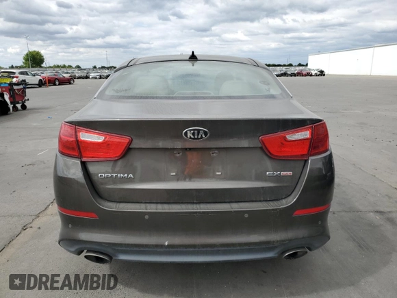 2015 Kia Optima EX with VIN 5XXGN4A70FG400845, listed as a Copart auction lot 54606275 with 144,953 mi miles and Clean Title. Bid and sale history available at carsss.com. Image 6.