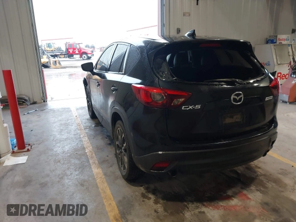 2016 Mazda CX-5 Grand Touring with VIN JM3KE2DY9G0705127, listed as a IAAI auction lot 41412910 with 181,993 mi miles. Bid and sale history available at carsss.com. Image 3.