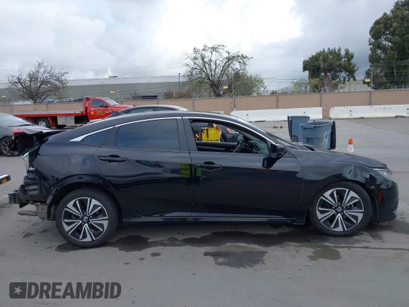 2016 Honda Civic Sedan EX-L with VIN 19XFC1F72GE217515, listed as a IAAI auction lot 41893795 with 130,703 mi miles. Bid and sale history available at carsss.com. Image 14.