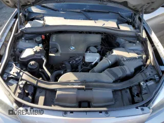 2014 BMW X1 xDrive28i with VIN WBAVL1C51EVY19441, listed as a Copart auction lot 44076115 with 107,830 mi miles and Salvage Title. Bid and sale history available at carsss.com. Image 12.