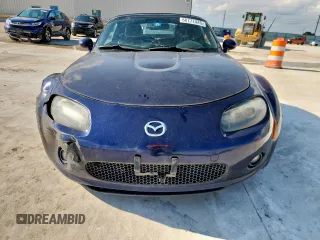 2007 Mazda MX-5 Miata Touring with VIN JM1NC25F770138120, listed as a Copart auction lot 60777425 with 184,029 mi miles and Salvage title. Bid and sale history available at DreamBid. Image 5.