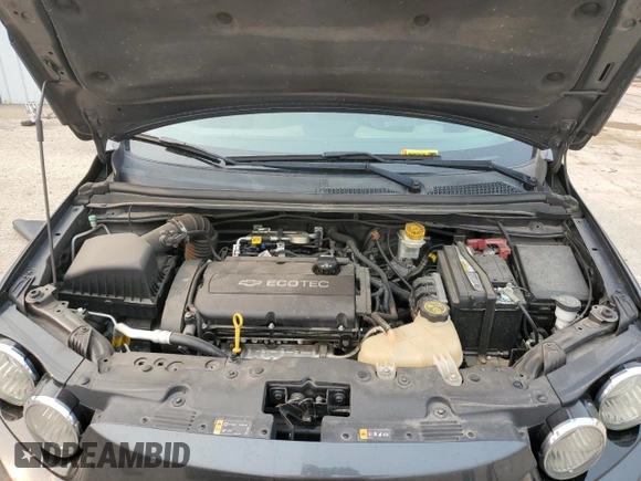 2016 Chevrolet Sonic LS z VIN 1G1JA5SH1G4103182, wystawiony jako Copart lot #59205495 z przebiegiem 107 537 mil mil oraz Szkoda całkowita • Salvage title. Historia ofert i sprzedaży dostępna na DreamBid. Obrazek 11.