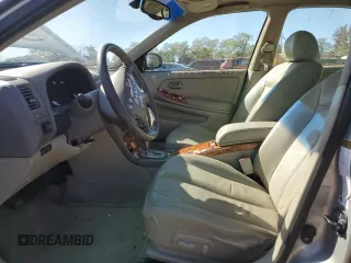 2004 Infiniti I35 with VIN JNKDA31A74T209553, listed as a Copart auction lot 76815534 with 169,505 mi miles and Salvage Title. Bid and sale history available at carsss.com. Image 7.
