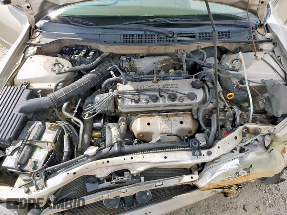 2000 Honda Accord LX z VIN 1HGCG5640YA035354, wystawiony jako Copart lot #58934115 z przebiegiem 167 536 mil mil oraz Szkoda całkowita • Salvage title. Historia ofert i sprzedaży dostępna na DreamBid. Obrazek 11.