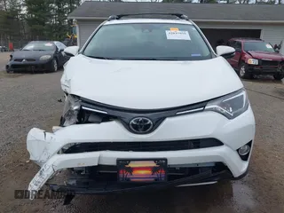 2018 Toyota RAV4 XLE with VIN JTMRFREV9JJ218173, listed as a IAAI auction lot 42037959 with 91,056 mi miles. Bid and sale history available at carsss.com. Image 13.