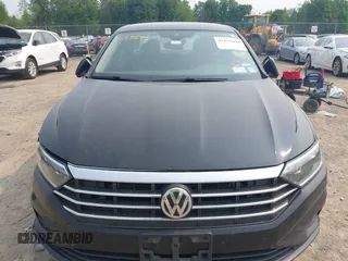 2020 Volkswagen Jetta SEL z VIN 3VWEB7BU9LM023817, wystawiony jako IAAI lot #42371694 z przebiegiem 99 100 mil mil oraz . Historia ofert i sprzedaży dostępna na DreamBid. Obrazek 12.