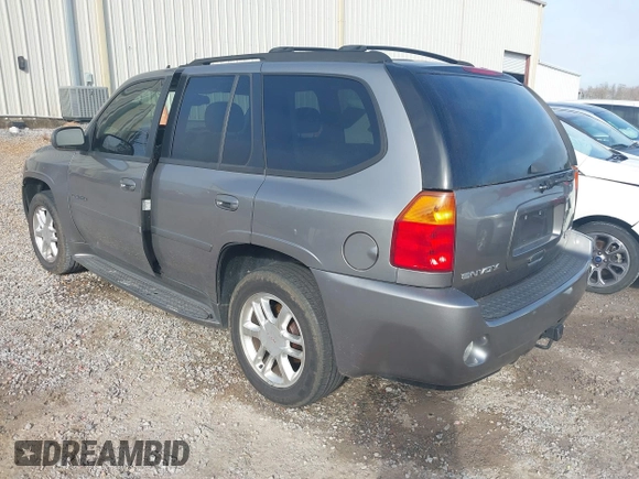 2006 GMC Envoy Denali with VIN 1GKES63MX62154590, listed as a IAAI auction lot 41439465 with 258,975 mi miles. Bid and sale history available at carsss.com. Image 3.