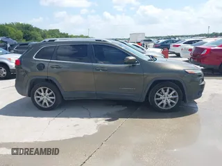 2016 Jeep Cherokee Limited z VIN 1C4PJLDB2GW136260, wystawiony jako IAAI lot #42751413 z przebiegiem 289 997 mil mil oraz . Historia ofert i sprzedaży dostępna na DreamBid. Obrazek 13.