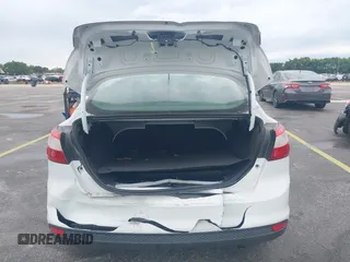 2012 Ford Focus SE with VIN 1FAHP3F25CL239383, listed as a IAAI auction lot 41656033 with 127,011 mi miles and . Bid and sale history available at DreamBid. Image 6.
