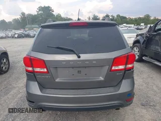 2013 Dodge Journey SXT with VIN 3C4PDCBG7DT568284, listed as a IAAI auction lot 42508928 with 215,803 mi miles and . Bid and sale history available at DreamBid. Image 16.