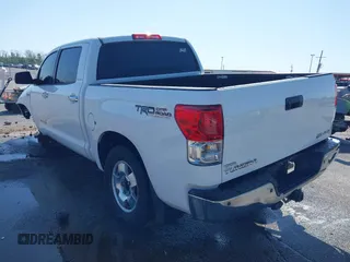 2012 Toyota Tundra 4WD Truck LTD with VIN 5TFHW5F1XCX269682, listed as a IAAI auction lot 41968019 with 166,074 mi miles. Bid and sale history available at carsss.com. Image 3.