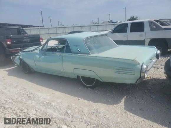 1961 Ford Thunderbird with VIN 1Y71Z144517, listed as a Copart auction lot 73210934 with 84,354 mi miles and Non Repairable. Bid and sale history available at DreamBid. Image 2.