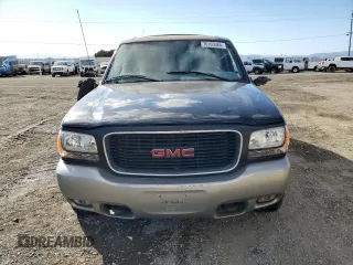 2000 GMC Denali z VIN 1GKEK13R8YR109690, wystawiony jako Copart lot #76165584 z przebiegiem 153 366 mil mil oraz Szkody całkowita. Historia ofert i sprzedaży dostępna na DreamBid. Obrazek 5.