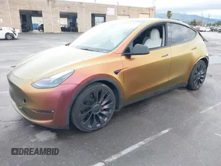 2023 Tesla Model Y Performance with VIN 7SAYGDEF4PF738885, listed as a IAAI auction lot 41798997 with 59,270 mi miles and . Bid and sale history available at DreamBid. Image 20.