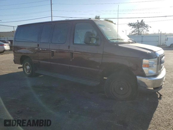 2010 Ford Econoline Passenger XL with VIN 1FMNE1BW6ADA87472, listed as a Copart auction lot 74989314 with 215,315 mi miles and Salvage Title. Bid and sale history available at DreamBid. Image 4.