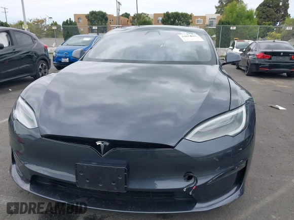 2021 Tesla Model S Long Range с VIN 5YJSA1E57MF441387, выставлен на аукционе IAAI как лот 42034307 с пробегом Не указан миль и . История ставок и продаж доступна на DreamBid. Изображение 12.