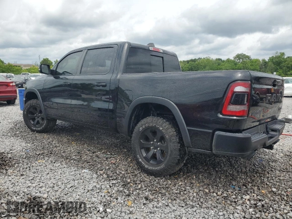 2020 Ram 1500 Rebel with VIN 1C6SRFLT5LN408810, listed as a Copart auction lot 56894725 with 49,089 mi miles and Salvage title. Bid and sale history available at DreamBid. Image 2.