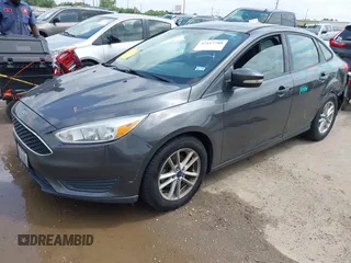 2017 Ford Focus SE with VIN 1FADP3F23HL232809, listed as a IAAI auction lot 42117700 with 104,802 mi miles and . Bid and sale history available at DreamBid. Image 17.