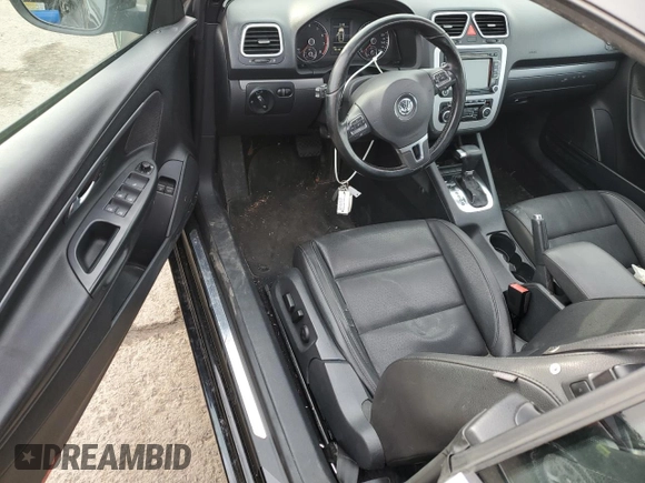 2011 Volkswagen Eos Komfort with VIN WVWBW7AH2BV003962, listed as a Copart auction lot 43893545 with 148,349 mi miles and Salvage Title. Bid and sale history available at DreamBid. Image 8.