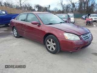 2002 Nissan Altima S with VIN 1N4AL11DX2C216559, listed as a IAAI auction lot 41540001 with 112,084 mi miles. Bid and sale history available at carsss.com. Image 1.