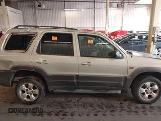 2004 Mazda Tribute ES with VIN 4F2CZ96104KM03252, listed as a IAAI auction lot 41153343 with 204,621 mi miles and . Bid and sale history available at carsss.com. Image 13.