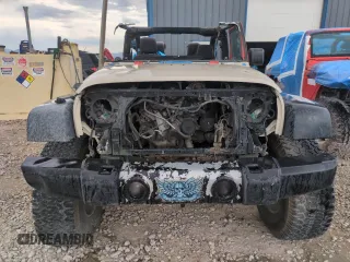 2013 Jeep Wrangler Sahara with VIN 1C4AJWBG9DL560781, listed as a Copart auction lot 61980265 with 86,436 mi miles and Salvage title. Bid and sale history available at DreamBid. Image 5.
