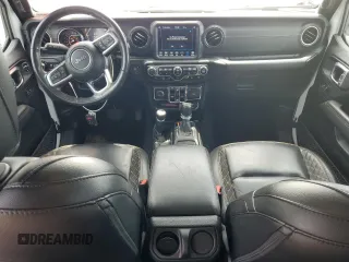 2021 Jeep Wrangler Unlimited Sahara Altitude with VIN 1C4HJXEG1MW586273, listed as a Copart auction lot 61723485 with 76,236 mi miles and Salvage title. Bid and sale history available at DreamBid. Image 8.