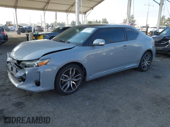 2014 Scion tC with VIN JTKJF5C7XE3079765, listed as a IAAI auction lot 41210220 with 114,410 mi miles. Bid and sale history available at carsss.com. Image 17.
