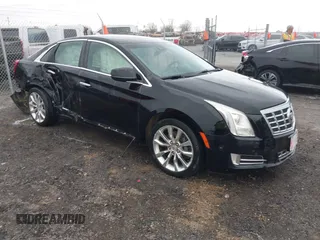 2015 Cadillac XTS Luxury with VIN 2G61M5S38F9138545, listed as a IAAI auction lot 41690696 with 136,460 mi miles and . Bid and sale history available at DreamBid. Image 1.