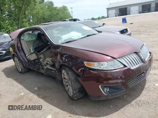 2012 Lincoln MKS with VIN 1LNHL9DRXCG802389, listed as a IAAI auction lot 39543911 with 97,957 mi miles. Bid and sale history available at carsss.com. Image 1.