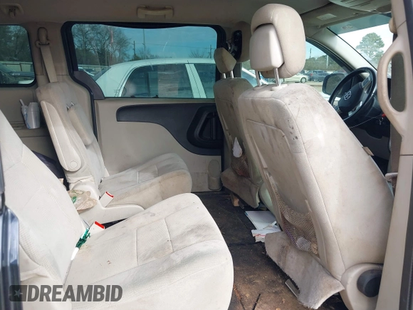 2014 Dodge Grand Caravan American Value with VIN 2C4RDGBG7ER102603, listed as a IAAI auction lot 41278072 with Not Provided miles and . Bid and sale history available at DreamBid. Image 8.