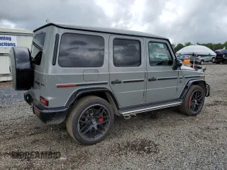 2023 Mercedes-Benz G 63 AMG with VIN W1NYC7HJ3PX477936, listed as a Copart auction lot 60379704 with 2,858 mi miles and Salvage Title. Bid and sale history available at DreamBid. Image 3.