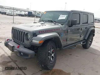 2020 Jeep Wrangler Unlimited Rubicon z VIN 1C4HJXFG2LW267154, wystawiony jako IAAI lot #41745497 z przebiegiem 28 692 mil mil oraz . Historia ofert i sprzedaży dostępna na DreamBid. Obrazek 22.