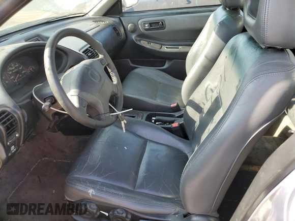1999 Acura Integra z VIN JH4DB7668XS005069, wystawiony jako Copart lot #61384394 z przebiegiem 207 353 mil mil oraz Szkoda całkowita • Salvage title. Historia ofert i sprzedaży dostępna na DreamBid. Obrazek 7.