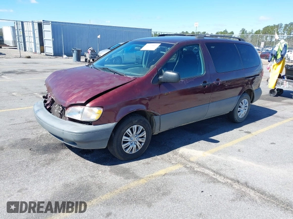 1999 Toyota Sienna LE with VIN 4T3ZF13C1XU112717, listed as a IAAI auction lot 41725827 with 272,639 mi miles. Bid and sale history available at carsss.com. Image 17.