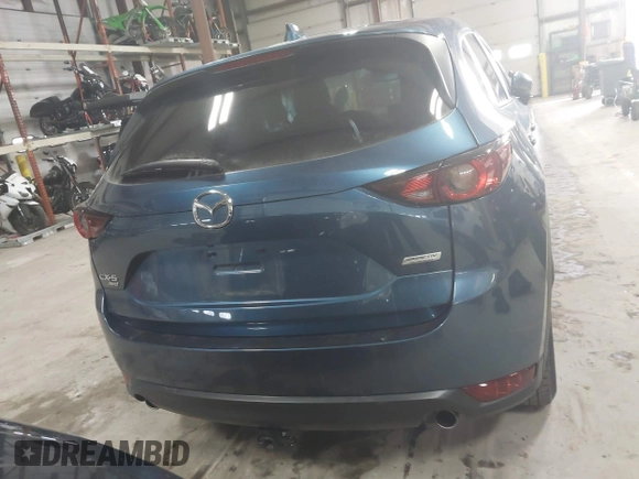 2019 Mazda CX-5 Touring with VIN JM3KFBCM1K0584369, listed as a IAAI auction lot 41657765 with 77,934 mi miles. Bid and sale history available at carsss.com. Image 16.