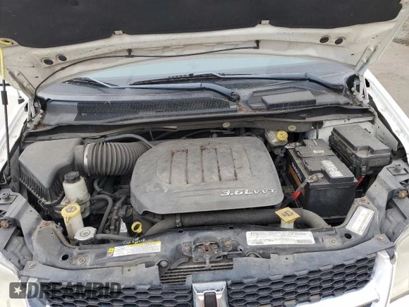2012 Dodge Grand Caravan SXT with VIN 2C4RDGCG6CR204681, listed as a Copart auction lot 80799044 with 183,195 mi miles and Salvage Title. Bid and sale history available at DreamBid. Image 12.