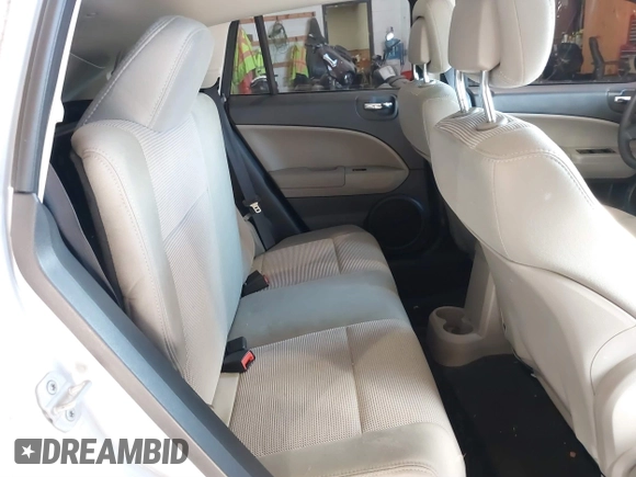 2011 Dodge Caliber Mainstreet with VIN 1B3CB3HA4BD121598, listed as a IAAI auction lot 41202366 with 92,012 mi miles. Bid and sale history available at carsss.com. Image 8.