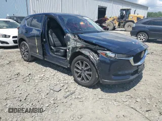 2018 Mazda CX-5 Touring with VIN JM3KFBCMXJ0460020, listed as a Copart auction lot 55997305 with 56,361 mi miles and Salvage Title. Bid and sale history available at DreamBid. Image 4.