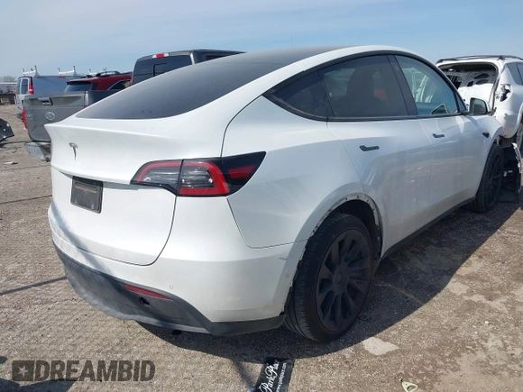 2022 Tesla Model Y Long Range with VIN 7SAYGDEE4NF428434, listed as a IAAI auction lot 41578503 with 35,460 mi miles and . Bid and sale history available at DreamBid. Image 4.