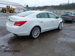 2014 Buick LaCrosse Premium II with VIN 1G4GF5G39EF305460, listed as a IAAI auction lot 41951229 with 127,188 mi miles and . Bid and sale history available at DreamBid. Image 4.